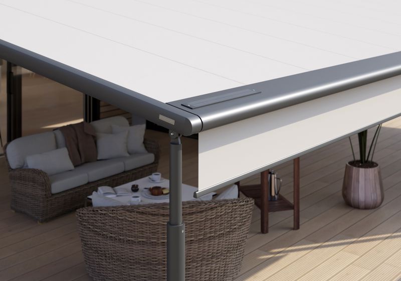 Detailed view of the integrated solar module for driving the motor of the vertical awning (shadeplus) in the drop profile of the pergola