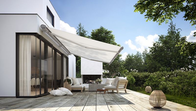 markilux mx-6000 in gray with white cloth over a terrace