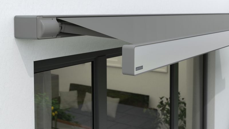 Cassette awning markilux 970 Eloxal silver on white wall