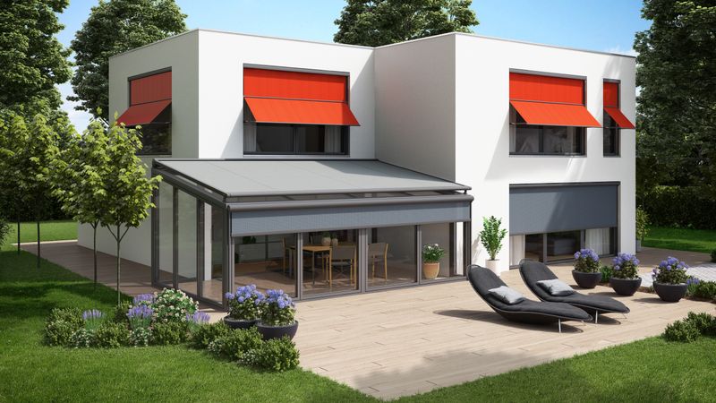 White flat roof house with conservatory awning equipped with different awnings: red marquisolette markilux 740 and gray conservatory awning.