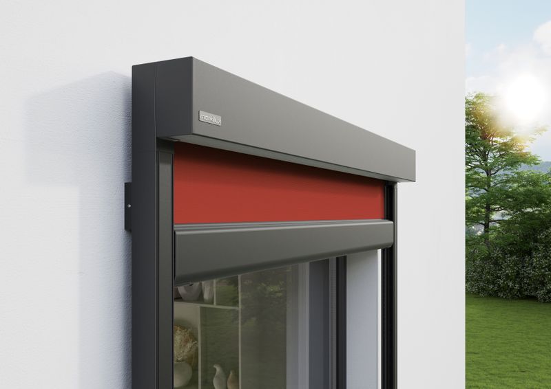 Detail view of vertical cassette awning markilux 776: gray frame, wall mounted.