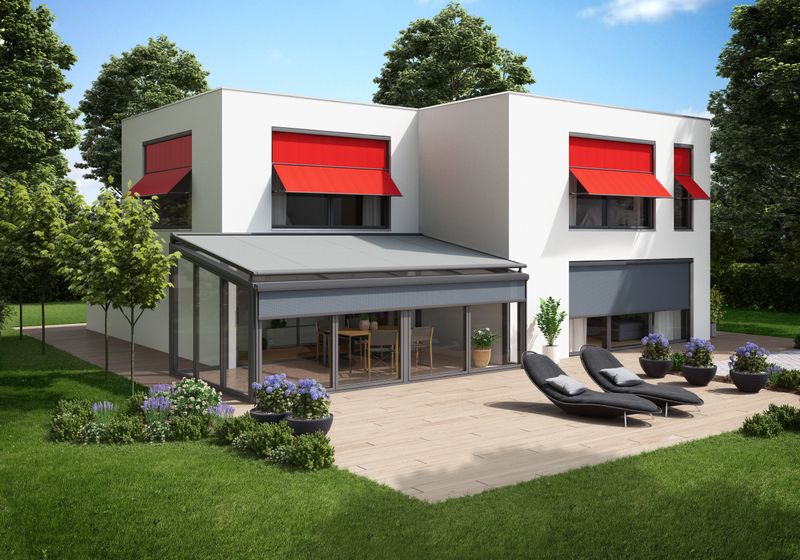 White cube equipped with various markilux awning models. The red marquisolettes provide shade on the upper floor. In the basement, window awnings and a top glass awning markilux 8800 are installed on the winter garden.