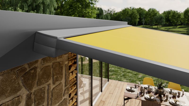 Detail view markilux pergola cubic angular fabric cassette with yellow fabric, full cassette