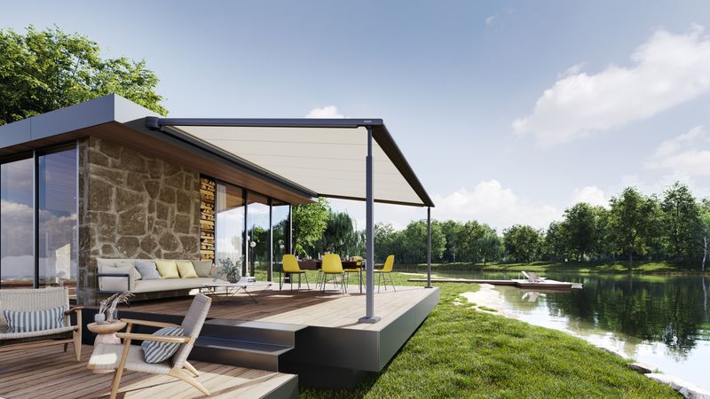 markilux pergola cubic (gray with white cloth) on a house by the lake