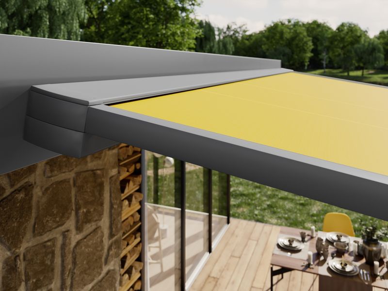 Detail view markilux pergola cubic: angular fabric cassette with yellow fabric (full cassette)