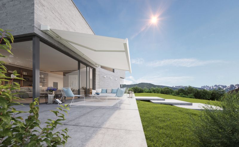 markilux MX-4 in white with white cloth on a mountain villa in the sunshine