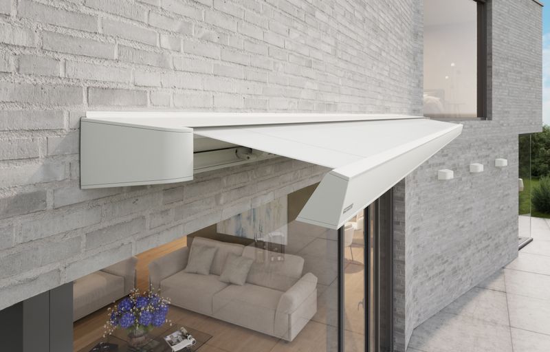 markilux MX-4 half open cassette awning in white with white cloth on gray house wall