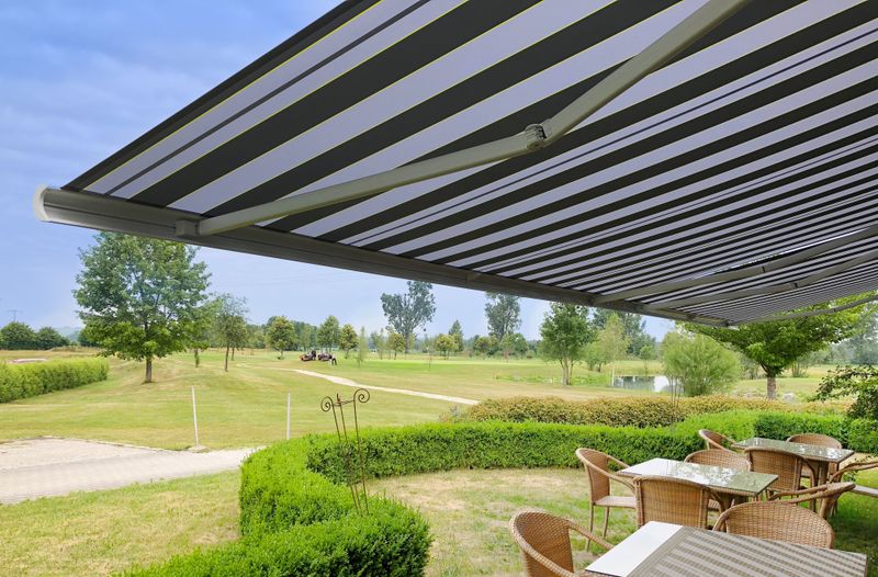 Reference image of awning with a black and white striped fabric cover Bad Füssingen