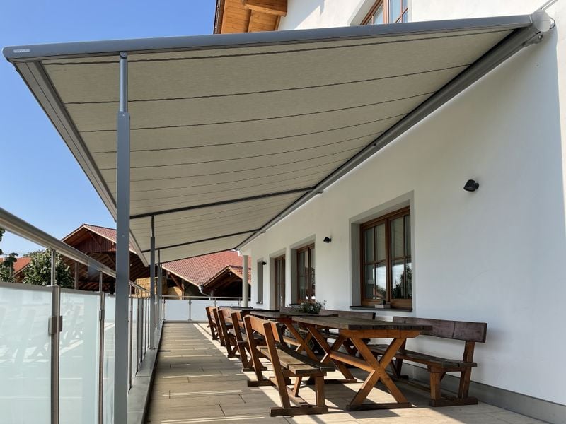 reference markilux pergola classic on the balcony with gray fabric cover