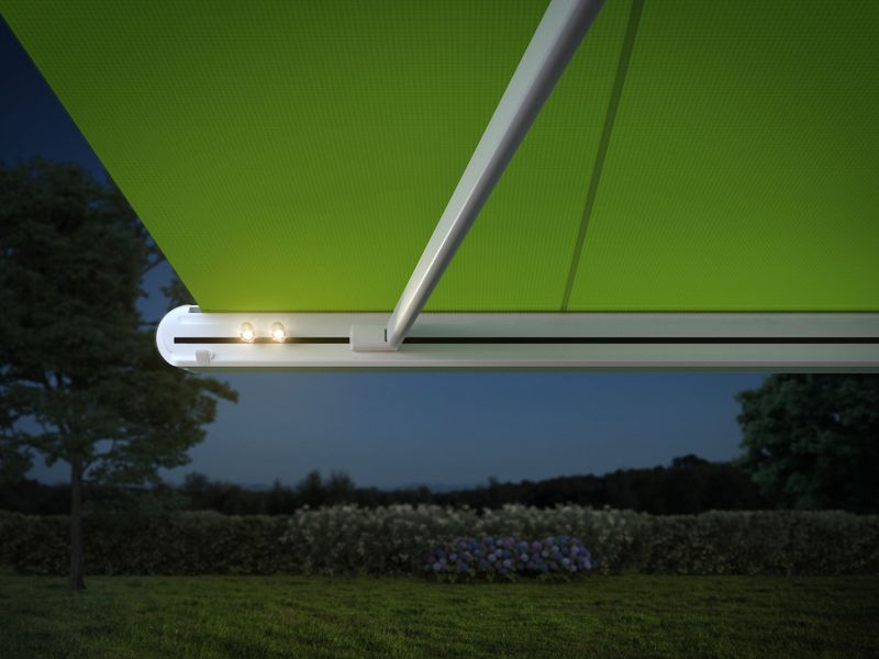 cassette awning mx-1 compact with green fabric cover with led-spots in front profile