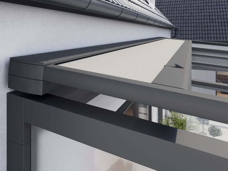 Detail view of the cassette of the top glass awning markilux 7800 half open
