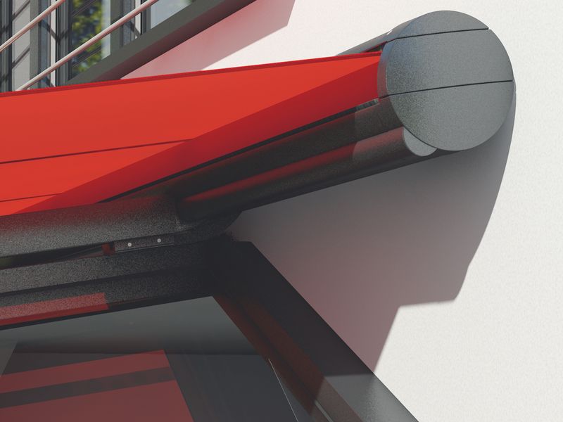 Detail picture cassette of the top glass awning markilux 8850, anthracite with red fabric cover.