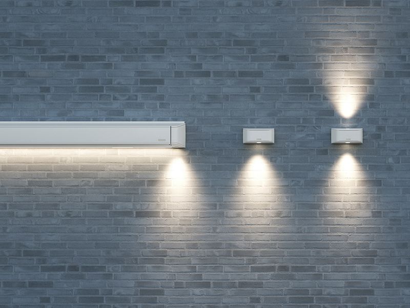 markilux MX-4 in weiß mit LED Line und zwei Leuchten in weiß an grauer Wand