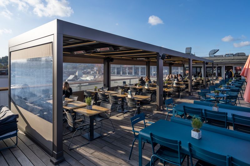Reference image of mx markant with radiant heaters and lighting options on a roof terrace in Bielefeld
